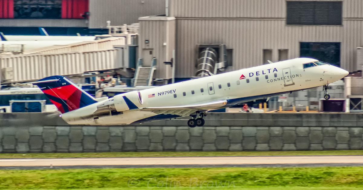 A Bombardier CRJ200 takes off from Atlanta Hartsfield International Airport in May 2019. Mitsubishi and ZeroAvia want to replace the model's GE CF34 engines with a liquid-hydrogen-powered powertrain. (Photo: Flickr: <a href="http://creativecommons.org/licenses/by/2.0/" target="_blank">Creative Commons (BY)</a> by <a href="http://flickr.com/people/cb-aviation-photography" target="_blank">Colin Brown Photography</a>)