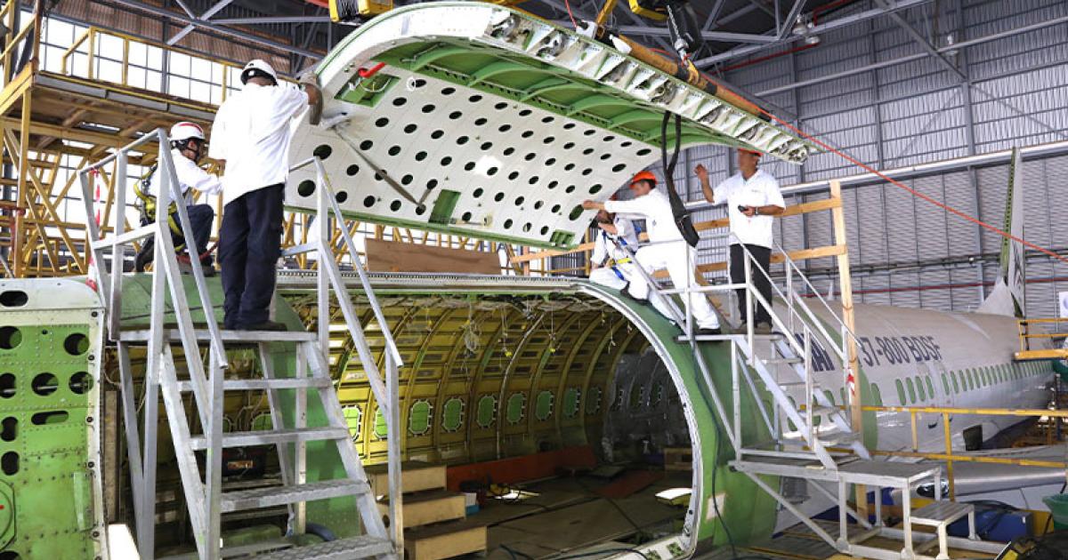 Technicians at Israel Aerospace Industries work on a Boeing 737-800 passenger-to-freighter conversion. (Photo: IAI)