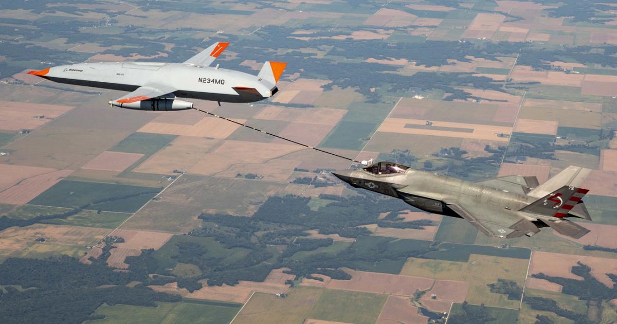 MQ-25 T1 refuels a VX-23 F-35C on September 13. The Aerial Refueling Store is the same as that currently employed by the Super Hornet for carrierborne tanker duties. (Photo: Boeing)