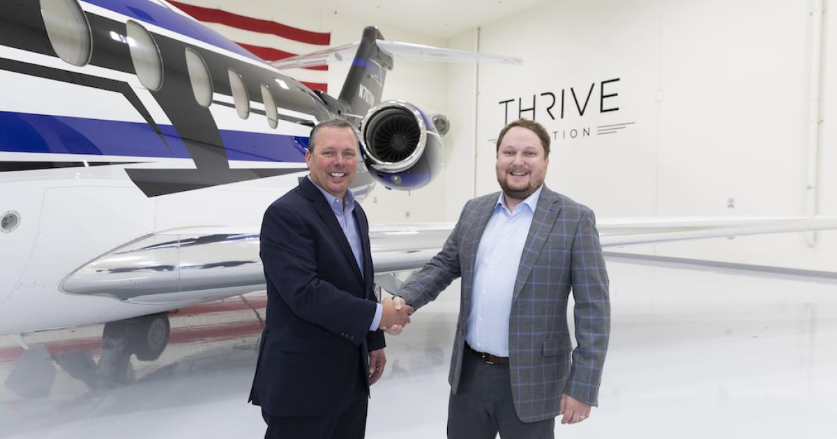 Lannie O'Bannion (left), Textron Aviation senior v-p of global sales and flight operations, with Thrive Aviation CEO Curtis Edenfield. (Photo: Textron Aviation)