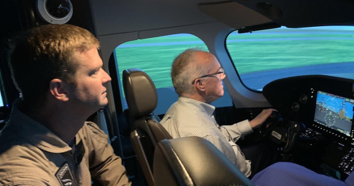 Test pilot Aaron Tobias (left) and the author in the Cessna SkyCourier lab simulator at the Textron Aviation campus in Wichita, Kansas.