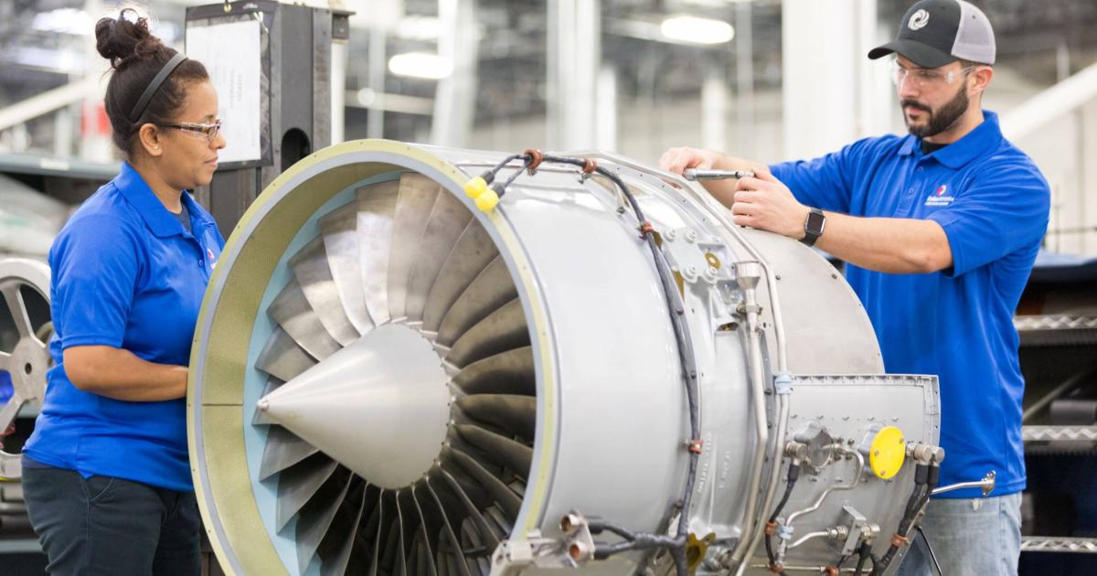 Dallas Airmotive technicians work on a turbofan engine at the company's facilities. Dallas Airmotive is a major piece of StandardAero's acquisition of Signature Aviation's engine repair and overhaul business. (Photo: StandardAero)