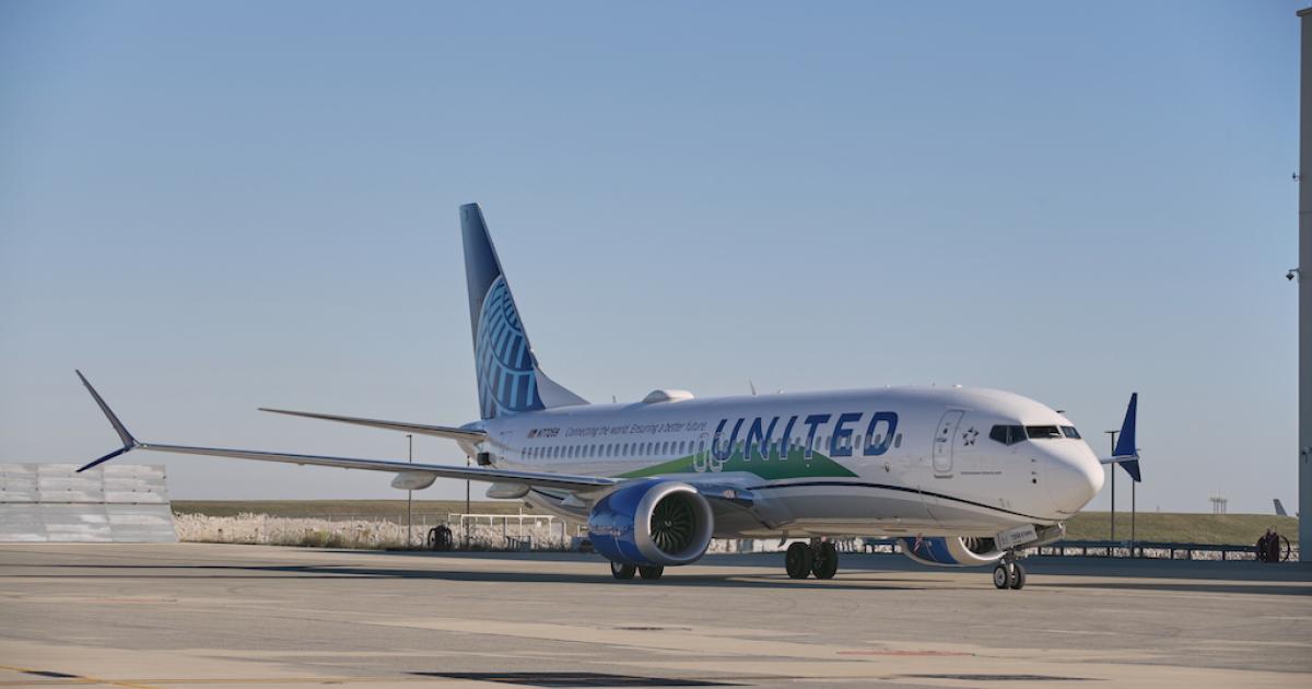 A United Airlines Boeing 737 Max 8 fueled with 100 percent SAF at Chicago O'Hare Airport prepares to fly a load of 100 passengers to Washington Reagan National Airport on December 1, 2021.
