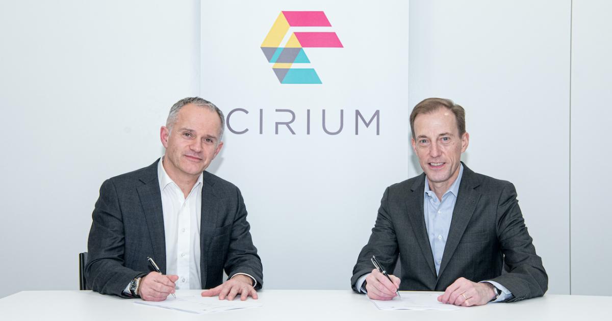Jeremy Bowen, Cirium CEO, and Don Thoma, Aireon CEO, sign a new agreement to bring together Aireon's global flight tracking data with Cirium's complete database of fleet, flight status, and airline schedules. (Photo: Business Wire)