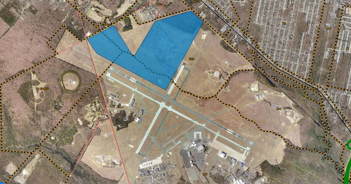 This satellite image of Atlantic City International Airport shows the available 400-acre leasehold (in blue) on the northwest corner of the field. Parties interested in developing it need to submit proposals to the South Jersey Transportation Authority by May 11. (Image: ACEA)