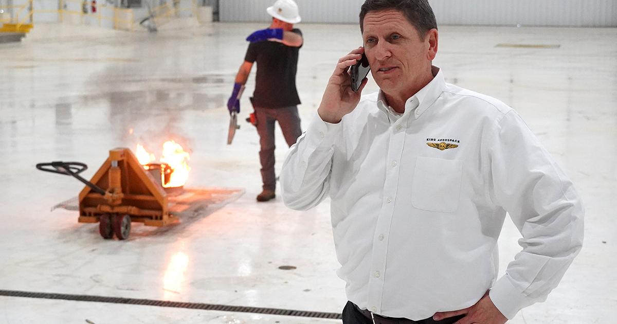 King Aerospace v-p Keith Weaver is present for fire suppression testing at King Aerospace's new facilities in Northwest Arkansas. Testing included lighting tins of jet-A on fire to trigger optical detection and fire-suppression releasing systems. (Photo: King Aerospace)