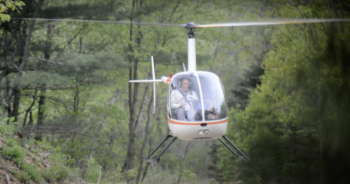 Antonio Santonastaso has been convicted of operating this Robinson R22 without an FAA pilot certificate and from his backyard, which was not an approved landing zone. (Screenshot: YouTube channel mysons mom)