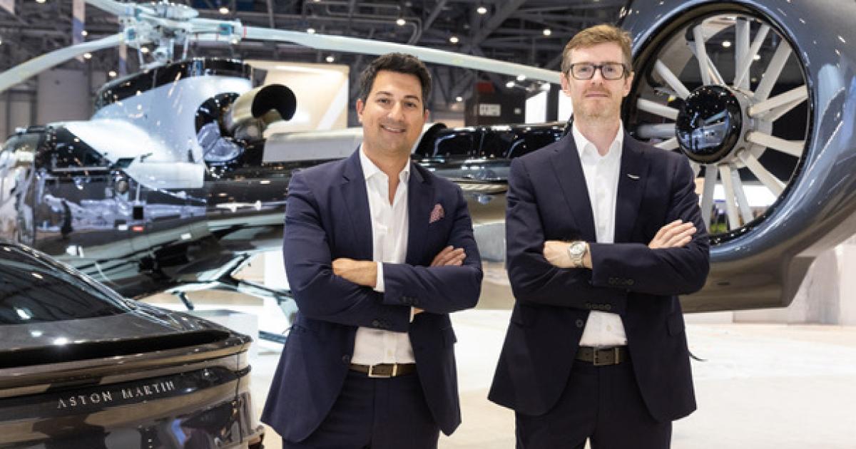 Frederic Lemos (left), head of Airbus Corporate Helicopters, and Cathal Loughnane, head of Aston Martin Partnerships, alongside the Airbus ACH130 Aston Martin Edition helicopter and Aston Martin DB 11 Superleggera on display at EBACE 2022. (Photo: Airbus)