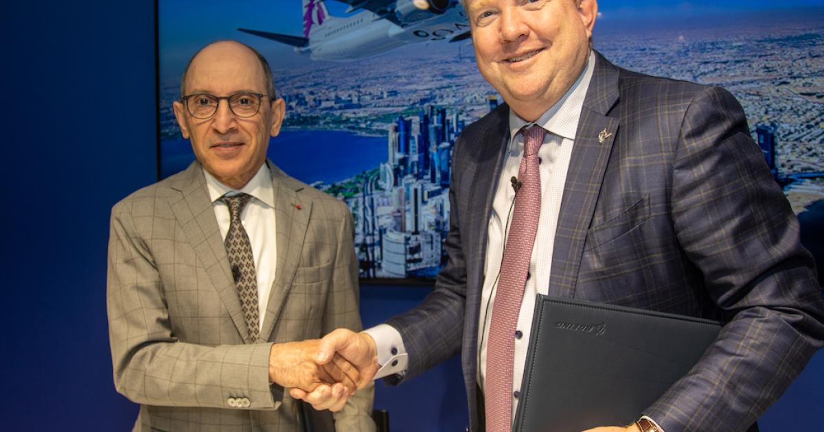 Qatar Airways CEO Akbar Al Baker and Boeing Commercial Airplanes CEO Stan Deal seal a deal for 25 Max 10s at Farnborough. 