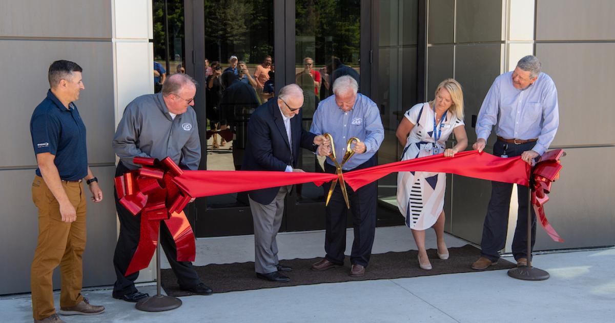 EAA Chairman and CEO Jack Pelton cut the ribbon on the new EAA Education Center during a ceremony on July 12. (Photo: EAA) 