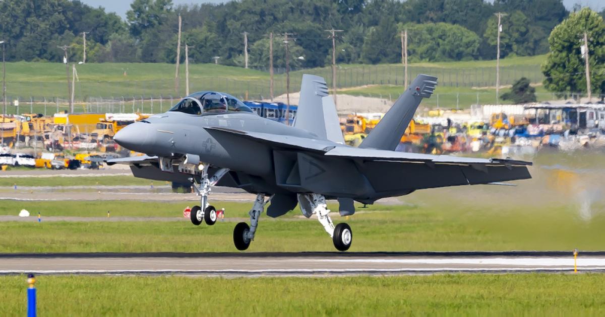 A Block III F/A-18F Super Hornet takes off from Boeing’s factory at St. Louis-Lambert Field. The latest production version introduces a wide-area touchscreen cockpit and increased connectivity. (Photo: Boeing)