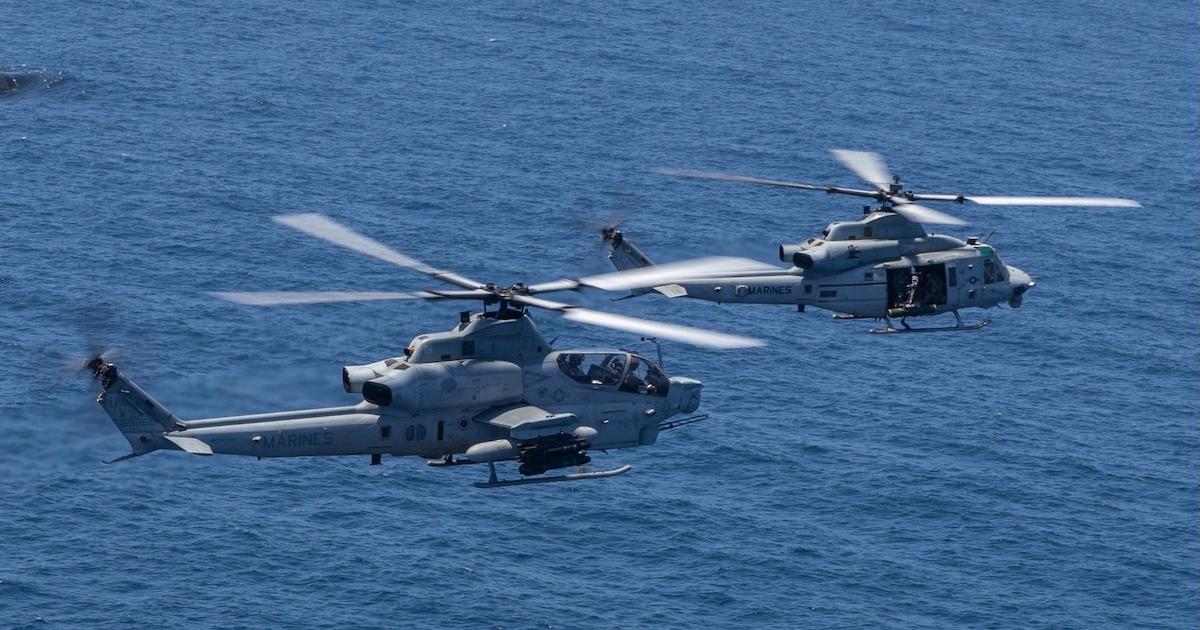 The AH-1Z (foreground) and UH-1Y are the mainstay of the U.S. Marine Corps attack/light assault helciopter fleet. The high commonality between the two types streamlines logistics and maintenance efforts. (Photo: U.S. Marine Corps)