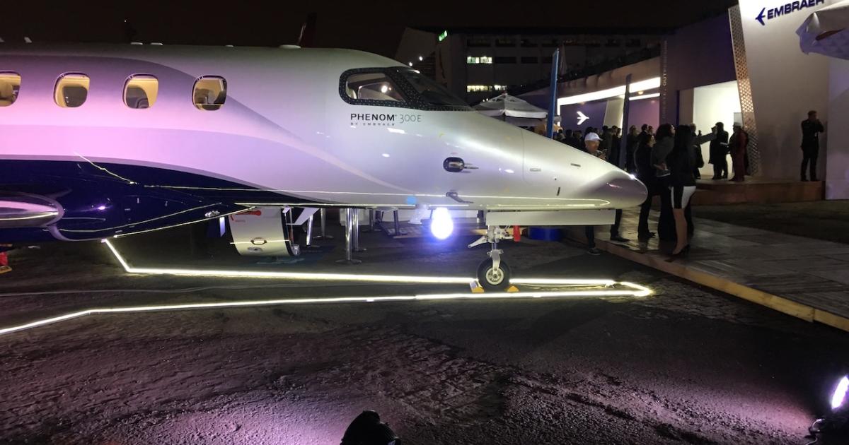 This photo from the 2018 edition of LABACE highlights one of the show's most appreciated attributes: it doesn't get started until noon each day and extends into the evening hours when visitors can enjoy a drink and conversations while ambling among the static display aircraft. (Photo: Matt Thurber/AIN)