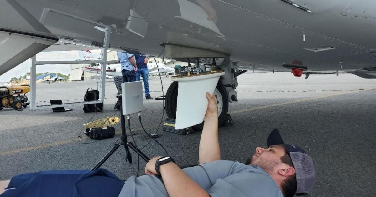 A technician installs SmartSky Networks' in-flight connectivity hardware on a Cessna Citation X operated by charter provider FlyExclusive. (Photo: SmartSky Networks)