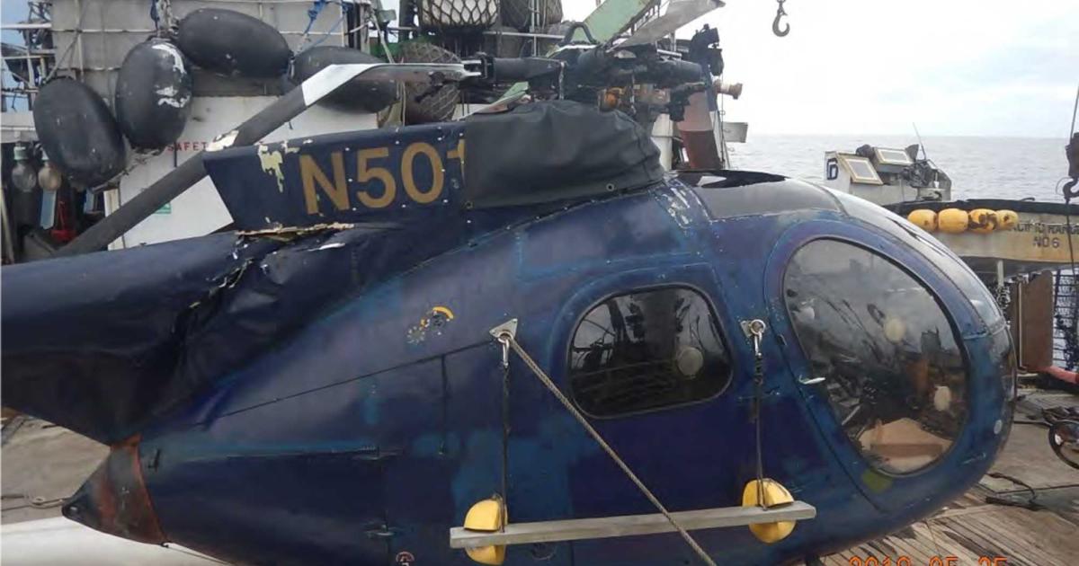 Crashed Hansen helicopter on tuna boat deck (Photo: U.S. Attorney's office).