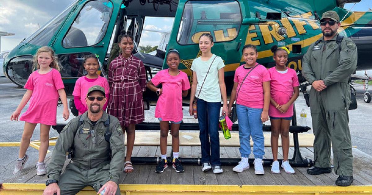 Among the attractions at the 8th annual Girls in Aviation Day hosted by Sheltair, were aircraft for the more than 1,200 attendees to explore and flight crews for them to talk to. (Photo: Women in Aviation International)