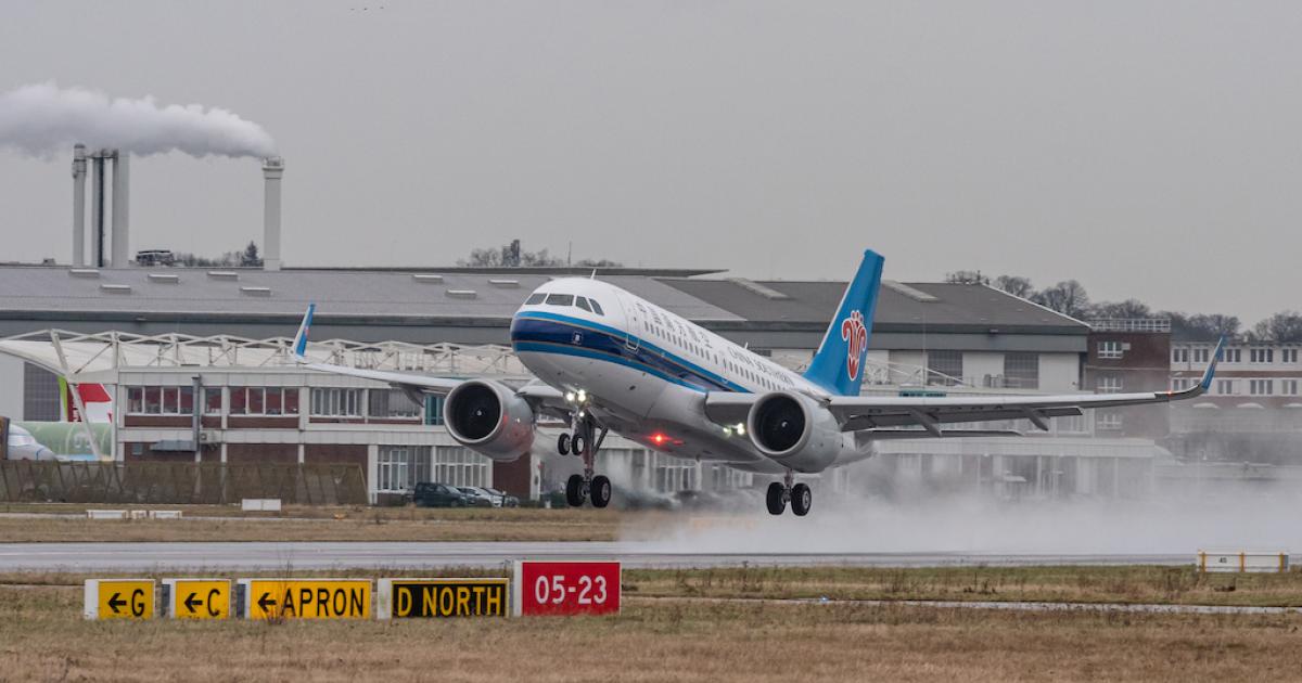 A China Southern Airlines Airbus A319 takes off from Hamburg on a delivery flight on February 18, 2022. At the time the airline and its subsidiaries operated more than 300 A320-family narrowbodies. (Photo: Airbus)