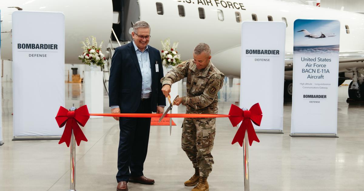 Bombardier celebrated its first military delivery, involving a Global 6000 for the U.S. Air Force, since it rebranded its defense division and declared its Wichita location to be its U.S. headquarters. L-r: Bombardier Defense v-p Steve Patrick and USAF Lt. Col Eric Inkenbrandt, the USAF's material leader for the Battlefield Airborne Communications Node program. (Photo: Bombardier)