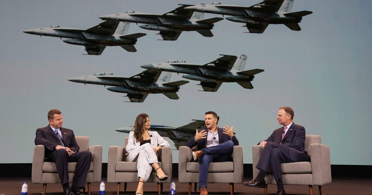(From left) Blue Angels pilot Frank Weisser, actress Monica Barbaro, aerial coordinator Kevin LaRosa II, and NBAA president and CEO Ed Bolen talk about the production of “Top Gun: Maverick” during a keynote presentation at the NBAA-BACE convention in Orlando, Florida, on Oct. 19, 2022.