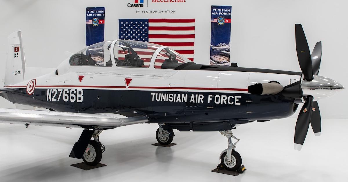 Wearing a temporary U.S. civil registration for test flying and ferrying, the first of eight T-6Cs for Tunisia is seen in the Beechcraft Wichita facility during its handover. (Photo: Textra Aviation Defense)