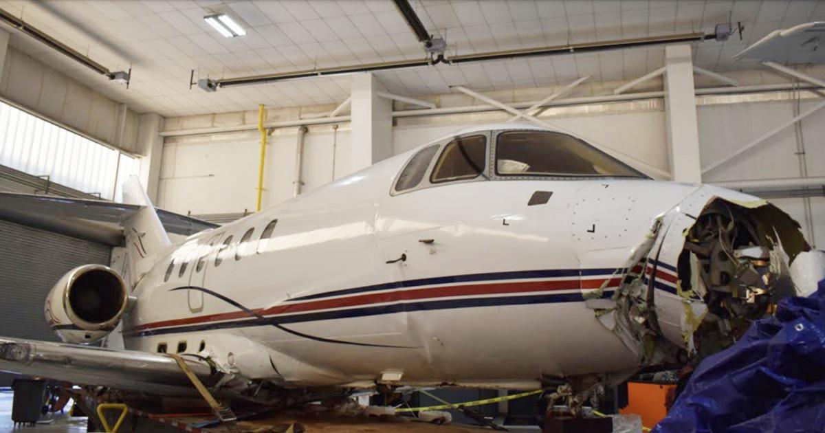 According to the NTSB, the crew's delayed decision to go around lead to the hard landing of a Hawker 800XP on Dec. 20, 2020, which substantially damaged the airplane and injured the copilot. (Photo: NTSB)