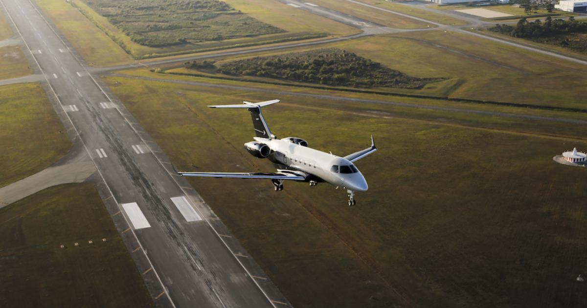 Air to air photo of Embraer Legacy 500 on takeoff