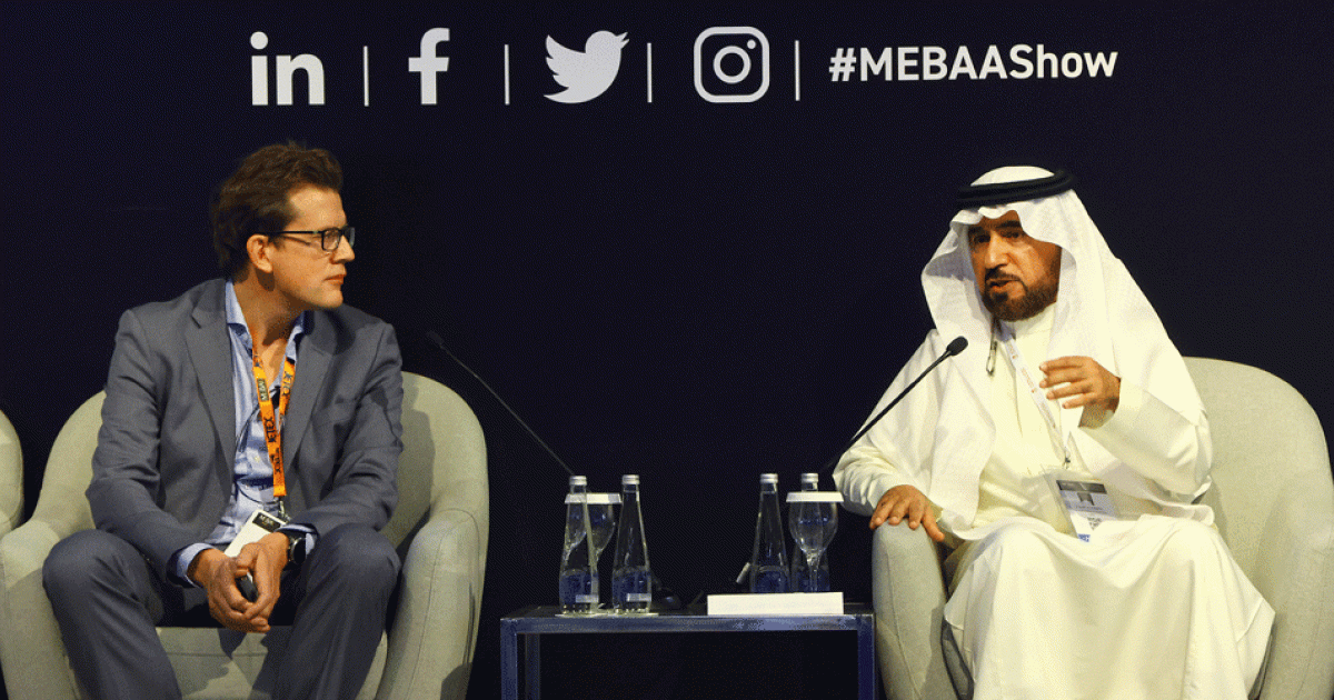 Richard Koe, managing director of WINGX Advance and Fahad Ibrahim Alijarboa, CEO Saudia Private Aviation on stage during MEBAA Show 2022