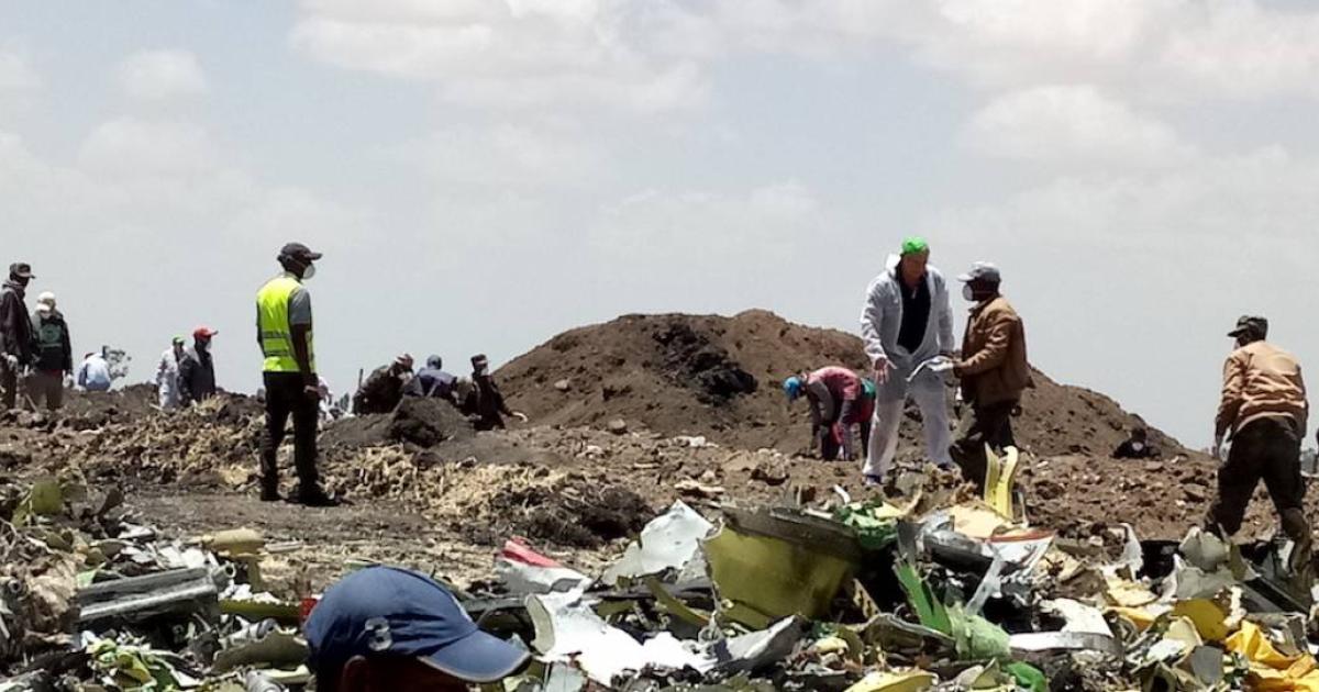 Recovery crews sift through the wreckage of the Ethiopian Airlines Boeing 737 Max