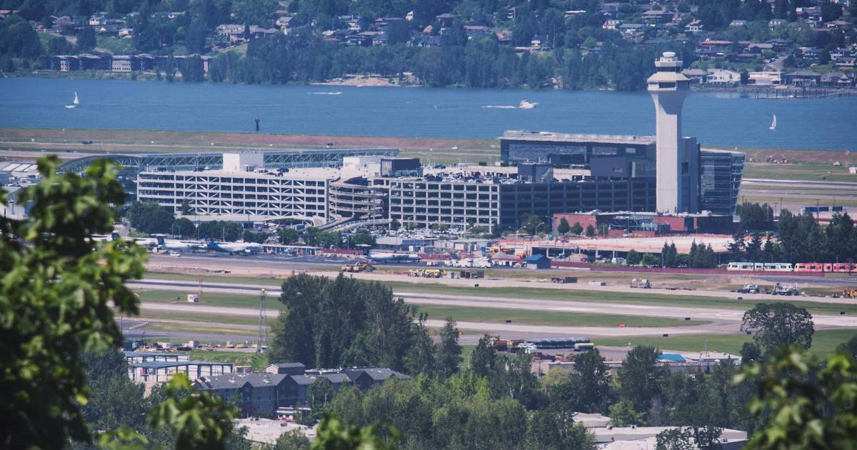 Terminal, gates and ATC tower at Portland International Airport, Oregon (PDX)