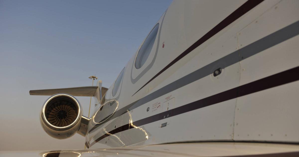 side view of business jet looking toward engine