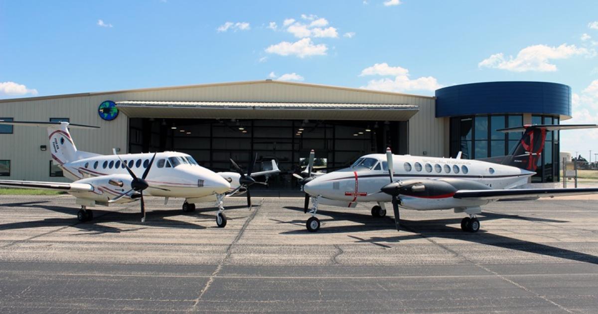 Beechcraft King Airs parked in front of Blackhawk Aerospace's headquarters