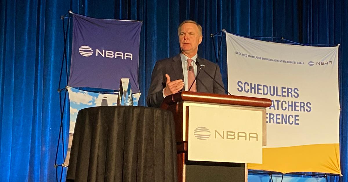 NBAA president and CEO Ed Bolen speaks on stage at SDC 2023