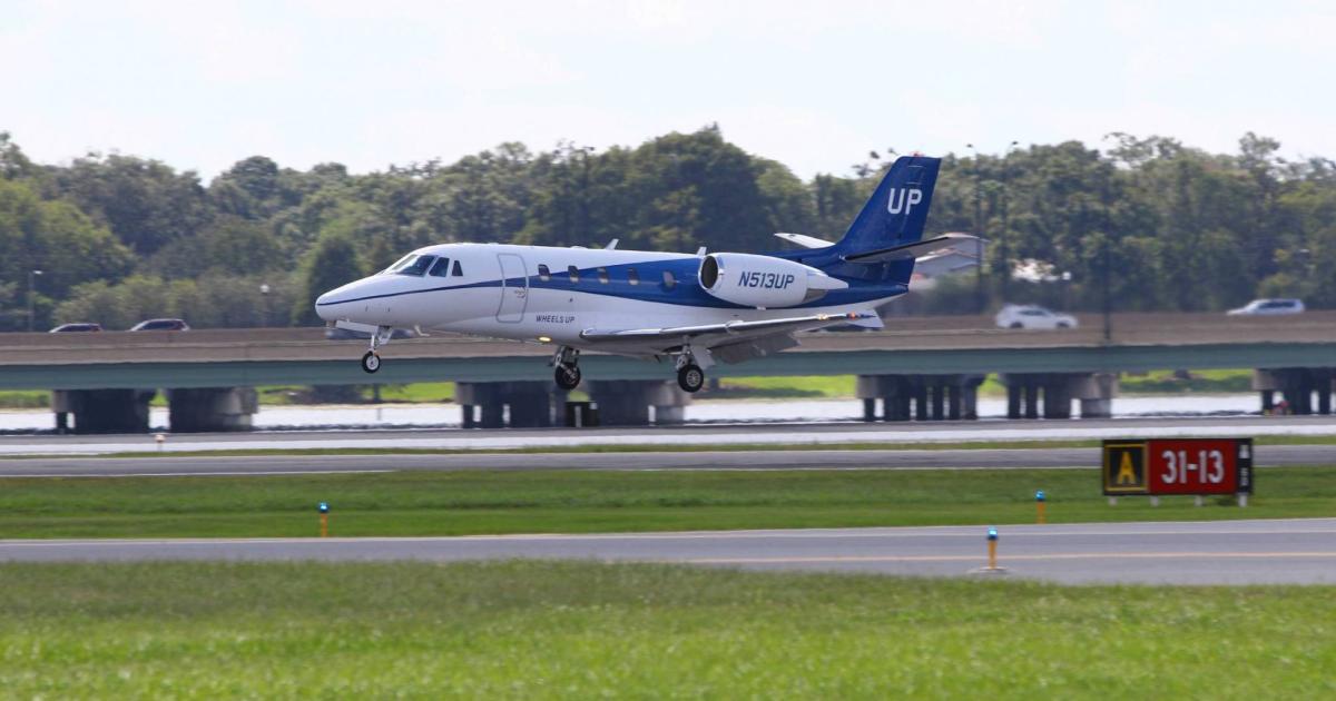 Wheels Up Citation Excel business jet on approach to landing
