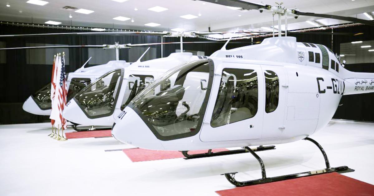 Three Bell 505 helicopters delivered to the Royal Bahrain Air Force in showroom