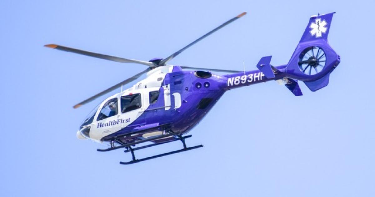 Health First EC135 air ambulance helicopter in flight