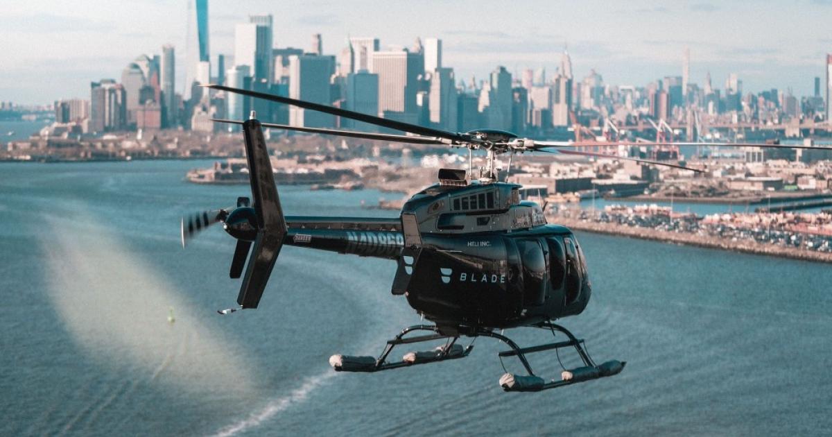 Blade helicopter flying over Hudson River with New York City skyline in background