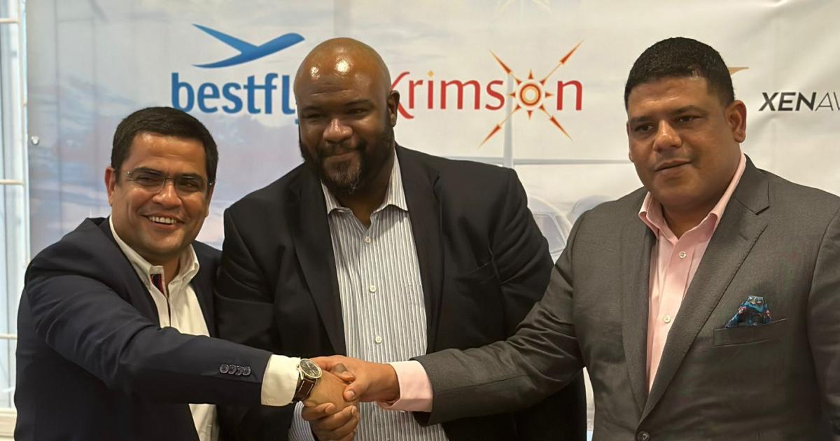 Nuno Pereira, managing director, Bestfly, left, and Morry Davis of Ethiopian's Krimson, center, put the seal on the launch of joint venture BFK Aviation, along with Ronaldo Alphonso, managing director of Guyana's Xen Aviation (Photo: BFK).