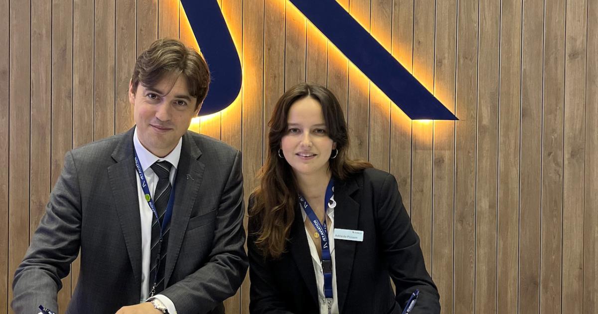 Jet Aviation's Jeremie Caillet and Donecle's Adelaide Poisson sign a contract to collaborate on drone-based aircraft inspections at EBACE 2023. (Photo: Jet Aviation) (Photo: 