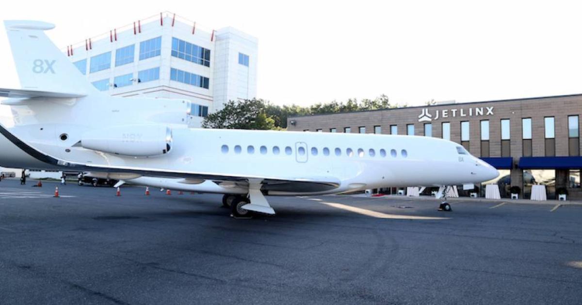 Jet Linx Dassault Falcon at airport FBO terminal