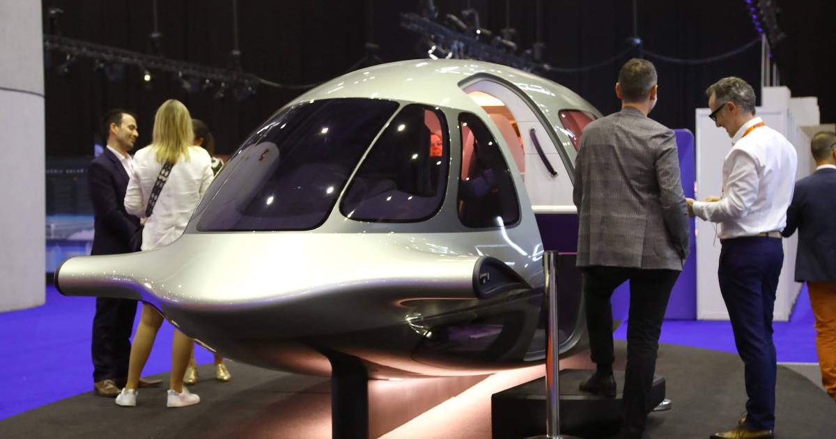 A mockup of the Lilium Jet eVTOL air taxi cabin is on display at EBACE 2023.