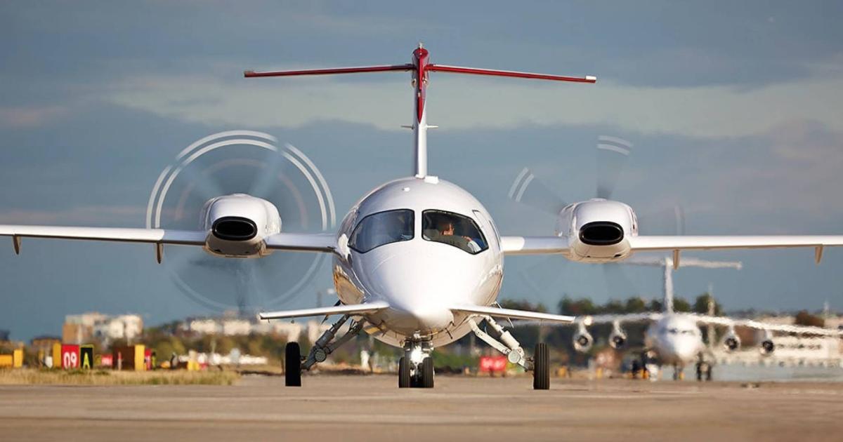 Nose view of Piaggio Avanti Evo on airport taxiway
