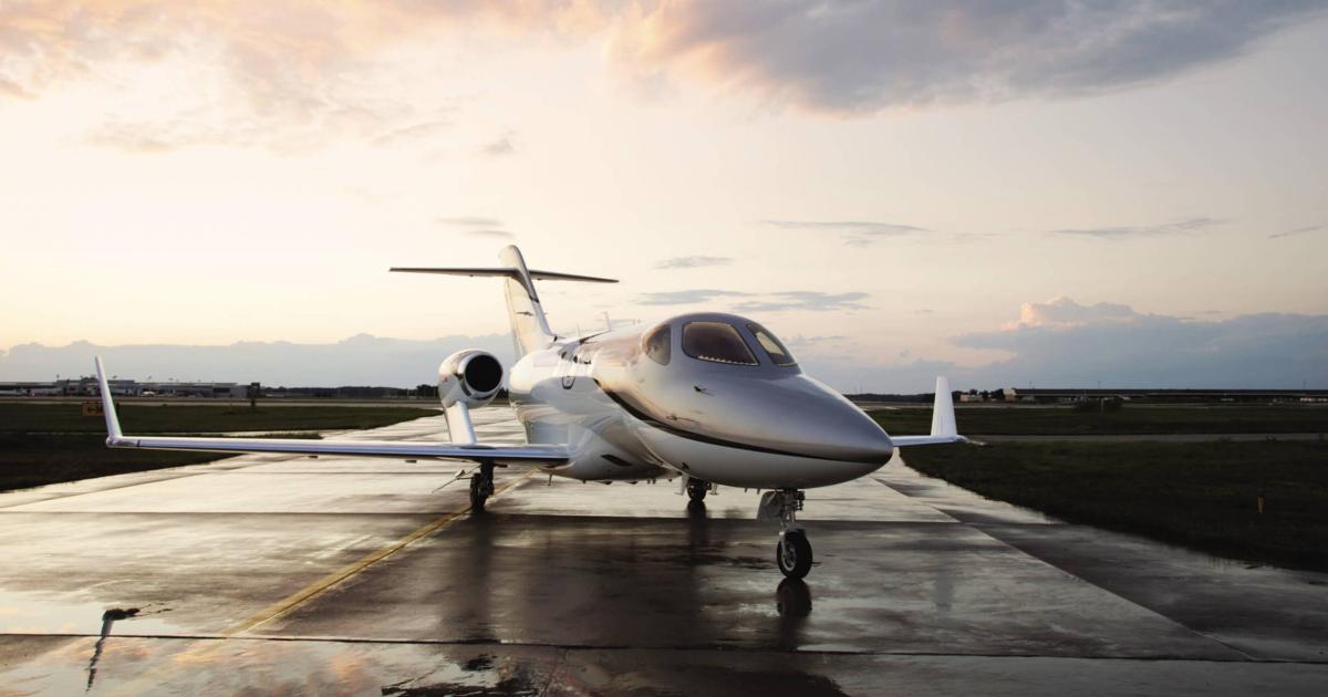 HondaJet parked on taxiway after rain shower