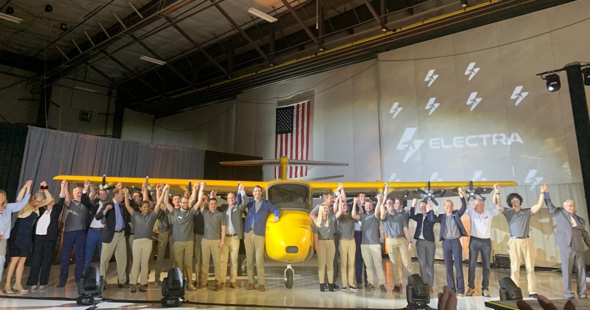 Electra employees in hangar with its eSTOL technology demonstrator aircraft.