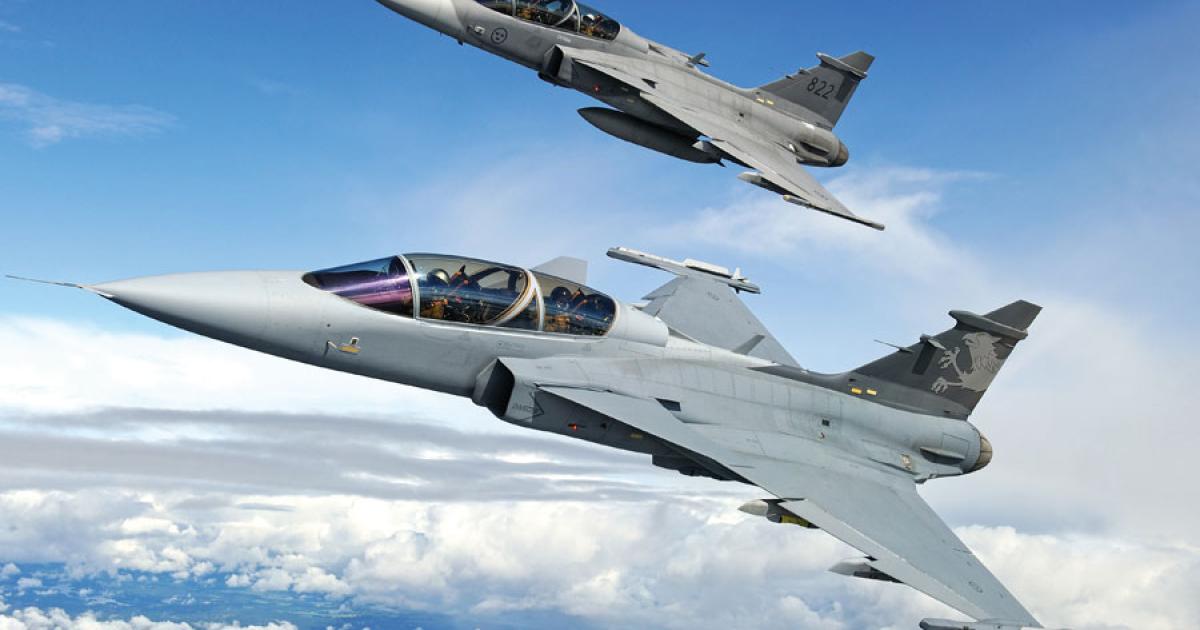 The next-generation Gripen E/F is already flying in two-seat prototype form, seen here in the company of a Gripen D. (Photo: Jamie Hunter for Saab)