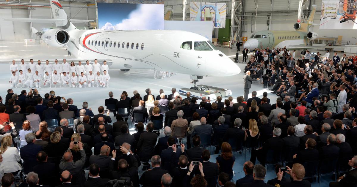 Dassault rolled out the first Falcon 5X prototype on June 2, 2015, at its Bordeaux, France factory before an audience of about 500 people. First flight of the 5,200-nm twinjet is pegged for summer 2015. (Photo: Dassault Falcon)