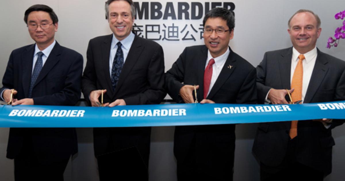 L to R: Bombardier China president Jianwei Zhang, Bombardier Aerospace president and COO Guy Hachey, Bombardier China general manager Albert Li and Bombardier Commercial Aircraft vice president of sales for China and North Asia Andy Solem cut the ribbon at Bombardier Aerospace’s new office in Shanghai. The office will soon be expanded to house Bombardier Business Aircraft staff as well.