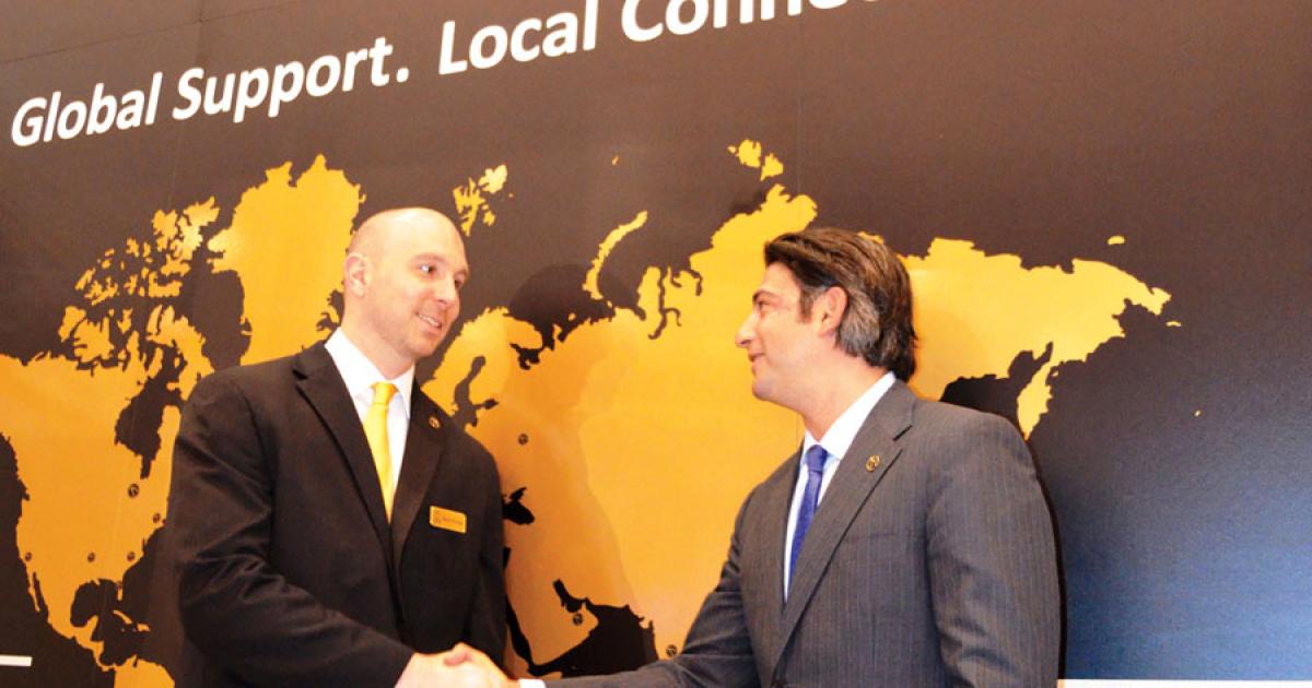 JSSI vice president for strategic planning and business development Kevin Thomas (left) sees Latin America as a key market for the company’s per flight hour maintenance programs. Here he is seen being congratulated by CEO Neil Book on signing up the group’s 10,000th asset to be covered at the EBACE show in May.