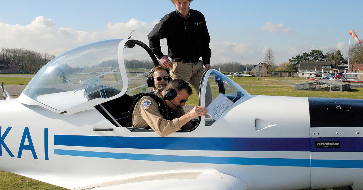 Preparing for flight with instructor Clarke “Otter” McNeace.