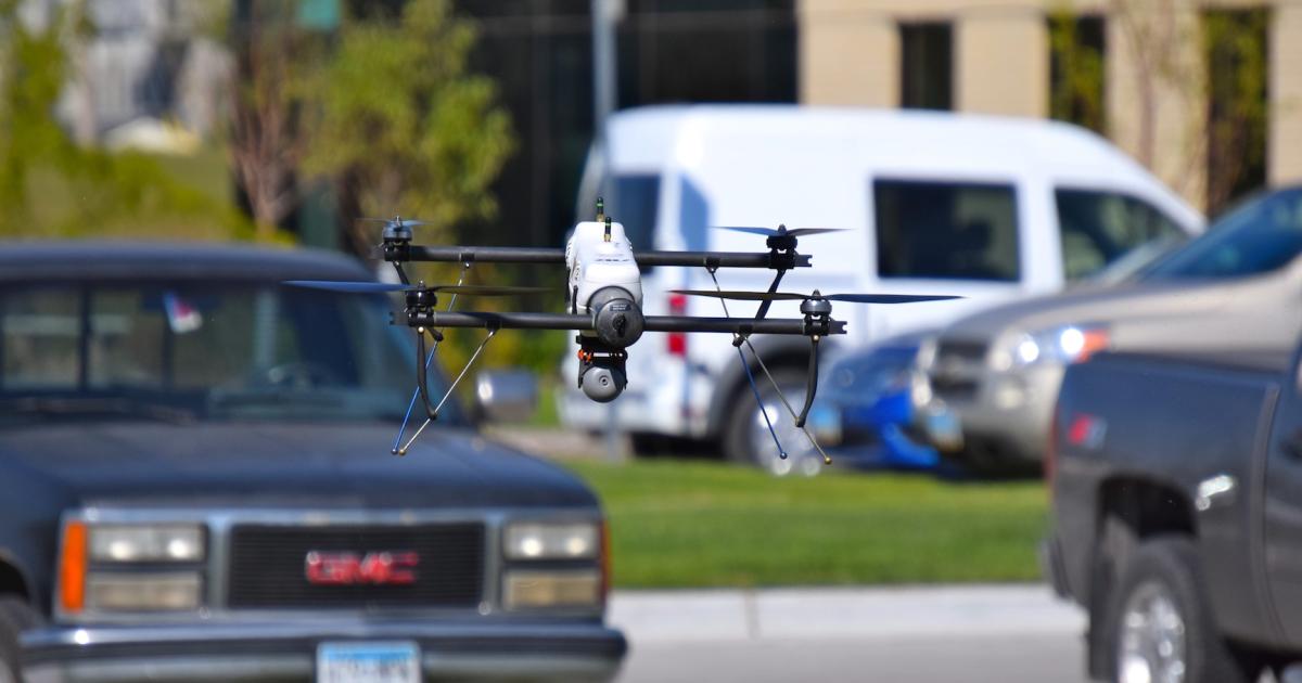 An AeroVironment Qube hovers above the ground at the University of North Dakota in Grand Forks. (Photo: Bill Carey)